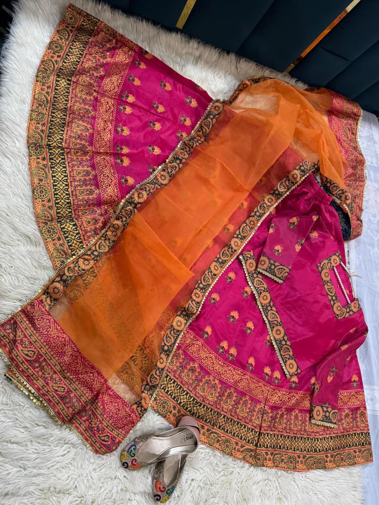 "Regal Radiance – Rawsilk Lehenga Choli Set with Tilla Embroidery & Block Print Detailing"