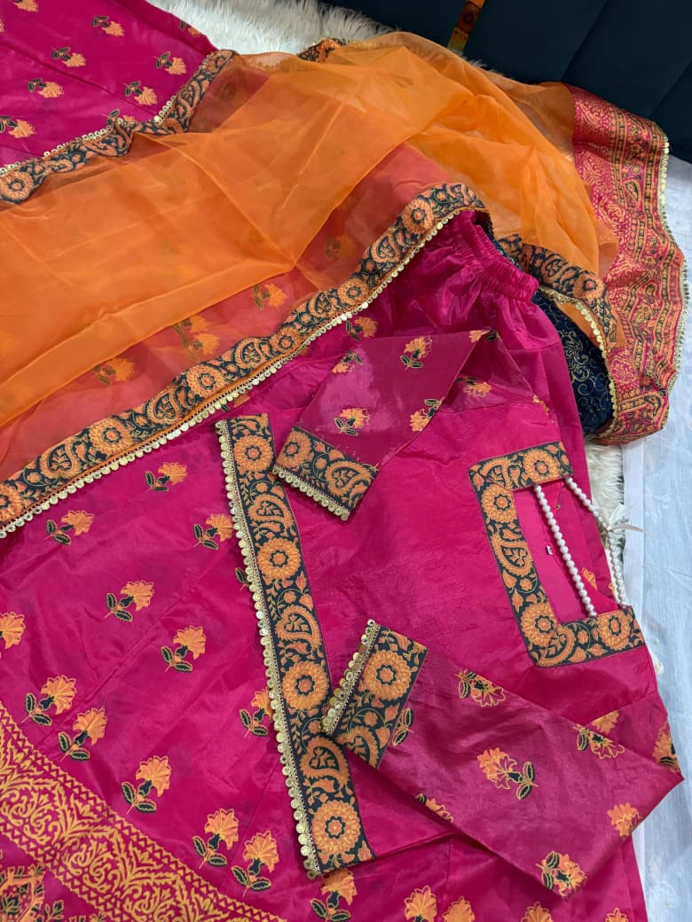 "Regal Radiance – Rawsilk Lehenga Choli Set with Tilla Embroidery & Block Print Detailing"